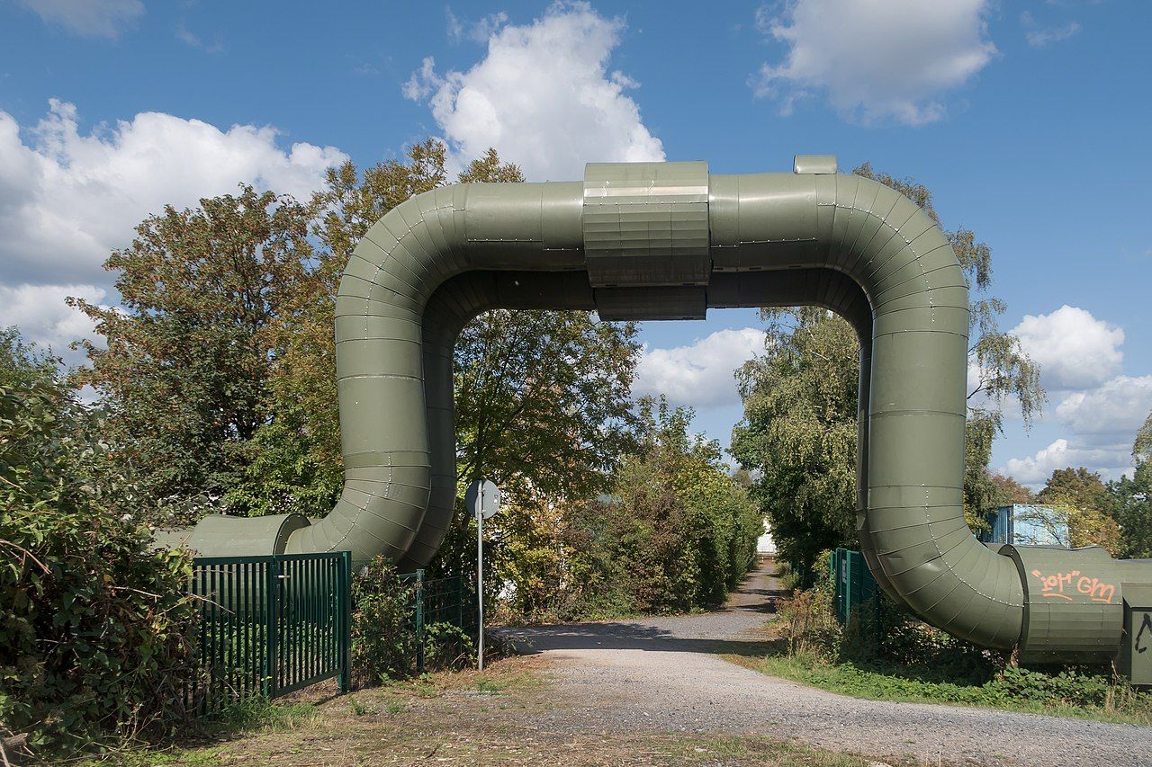 Industrial pipeline along the Emscher river in Gelsenkirchen-Erle, Germany